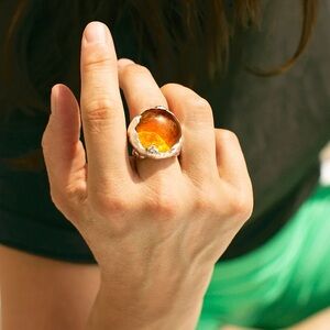 Elegant Amber Ring in Silver Setting